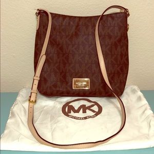 Michael Kors Crossbody purse. Dust cover included